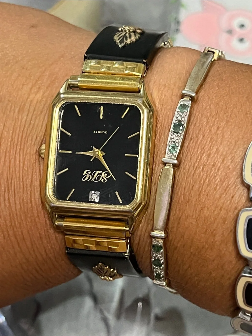 Gold-Tone Women's Watch with Black Dial and Black Bracelet Accent